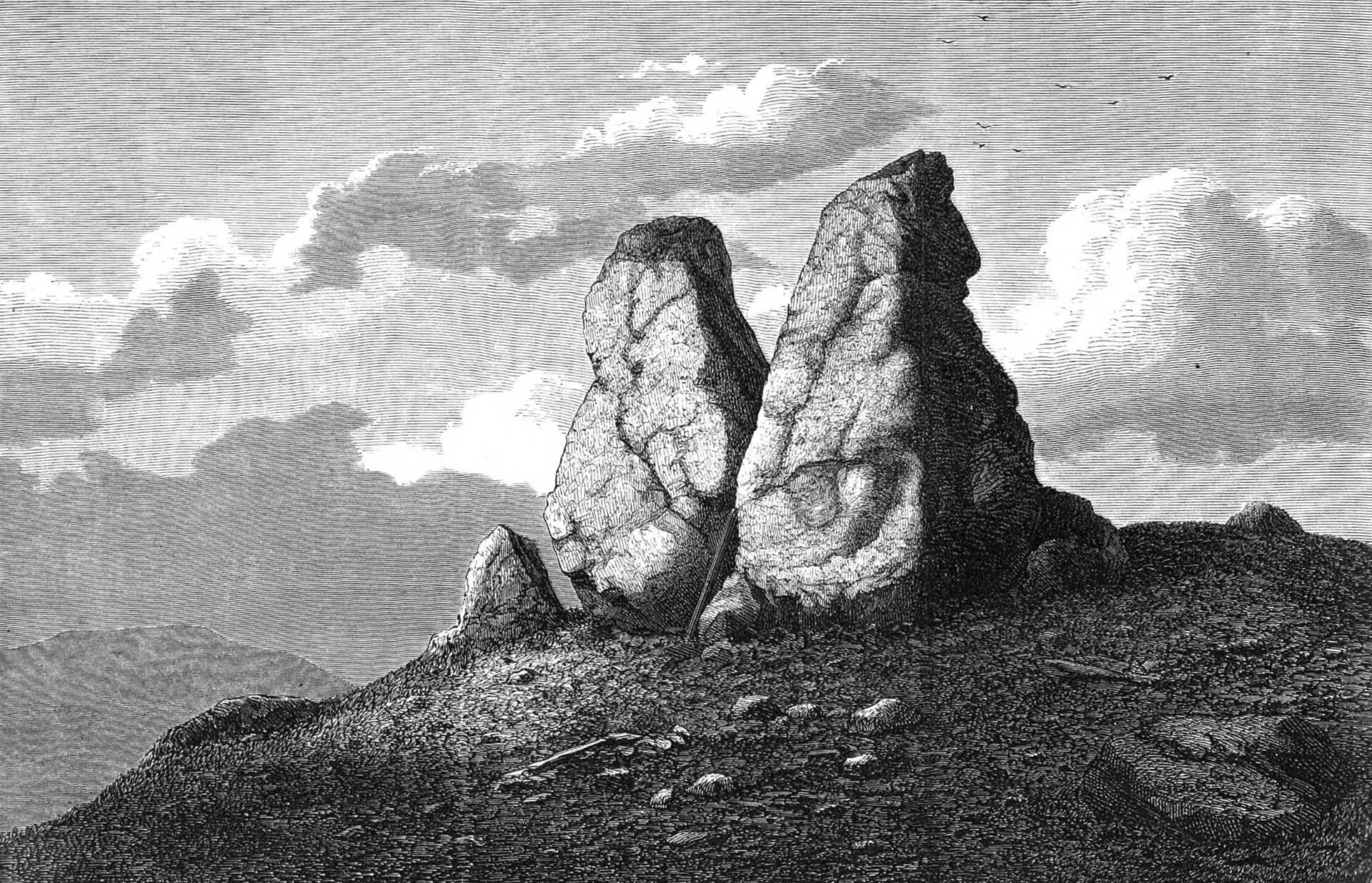 A nineteenth-century engraving of tall rounded standing boulders on a bare mountain summit, with a pole leaning between them and bones scattered on the ground.