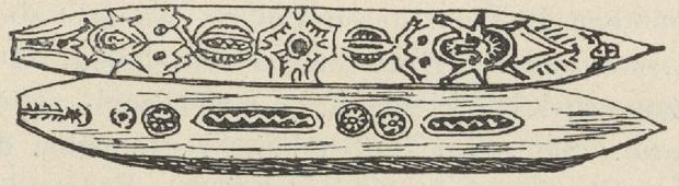 Two faces of a long pointed Bukaua blade, decorated with faces, loops, zigzags and repeated oval motifs.