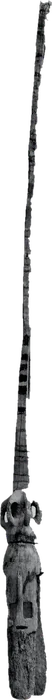 A Dogon imina na carving: a very long, narrow wooden shaft with repeated ridges above a small carved figure at its base.
