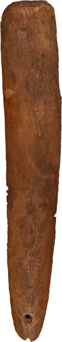 A plain, worn wooden bullroarer blade, pierced near one end.