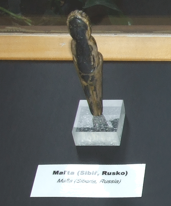 Facsimile of a slender, clothed female ivory figurine from Mal'ta in Siberia.