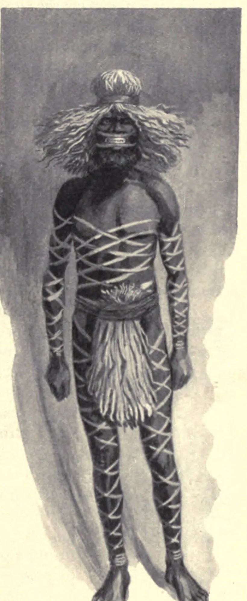 A man decorated for the Kuringal, wound from shoulder to ankle in stringy-bark fibre, wearing a fibre wig, his lips drawn back by cords to bare the teeth.