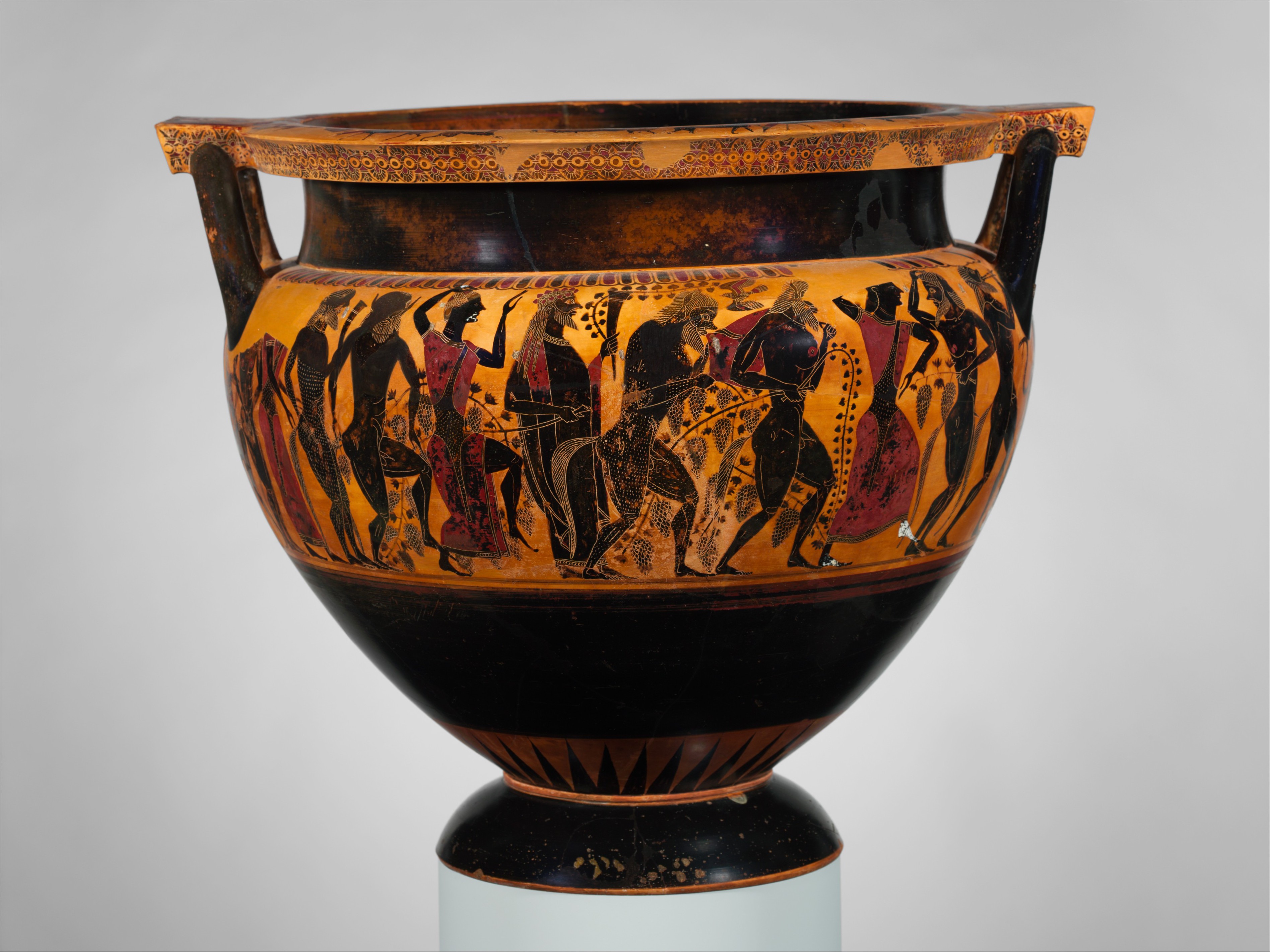 Black-figure Attic column-krater showing a Dionysiac procession of satyrs and maenads dancing among vines