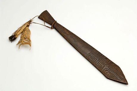 Marind-anim bull-roarer (bromhout, fish form), used in male initiation — Wereldmuseum, Merauke, South Papua.