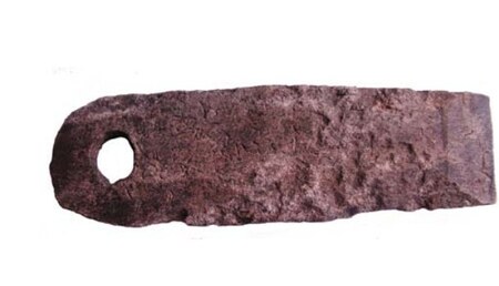 The perforated antler blade, find 143, from Groot Olmen.