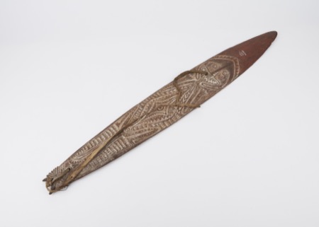 Representative—not this record’s object: a lanceolate gopi board from the Fly River District, the same Kiwai-delta type as the deaccessioned...