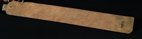 A plain Kissziget zúgattyú blade, drilled near one end and marked with handwriting near the other.