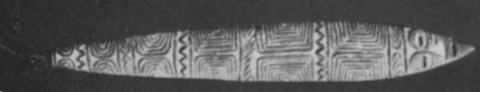 A long, narrow Marind sosom blade from South Papua, tapering at both ends and marked with repeated geometric bands (Kunst ill. 32).