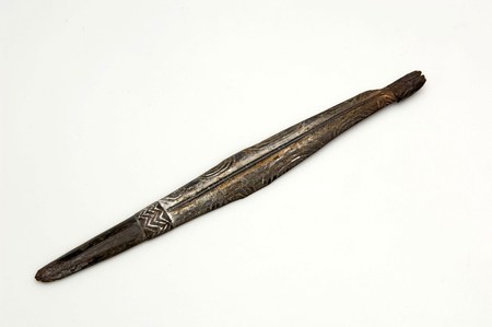 Marind bull-roarer, per the museum record used during boys' initiation to frighten the women — Wereldmuseum TM-2670-368 (before 1957)....
