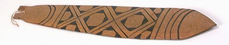 Representative—not this record’s object: a painted Wauja bullroarer from Brazil.