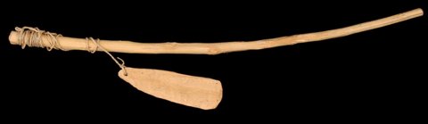 Representative—not this record’s object: Amhara bullroarer from Gondar, Ethiopia, a wooden blade on a cord tied to its whip-stick