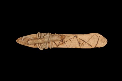 Representative—not this record’s object: a Garoua circumcision rhombe, collected 1932.