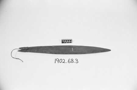Pitt Rivers Museum 1902.68.3: exact slender blade with a notched attachment and surviving fibre tie.