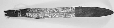 Gulf Province blade with a carved face and fibre cord