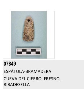 El Cierro accession 07849: perforated bone plaque labelled espátula-bramadera.