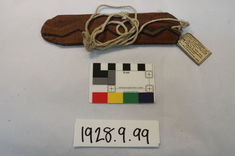 painted Hopi wooden blade with cord, Mishongnovi, PRM