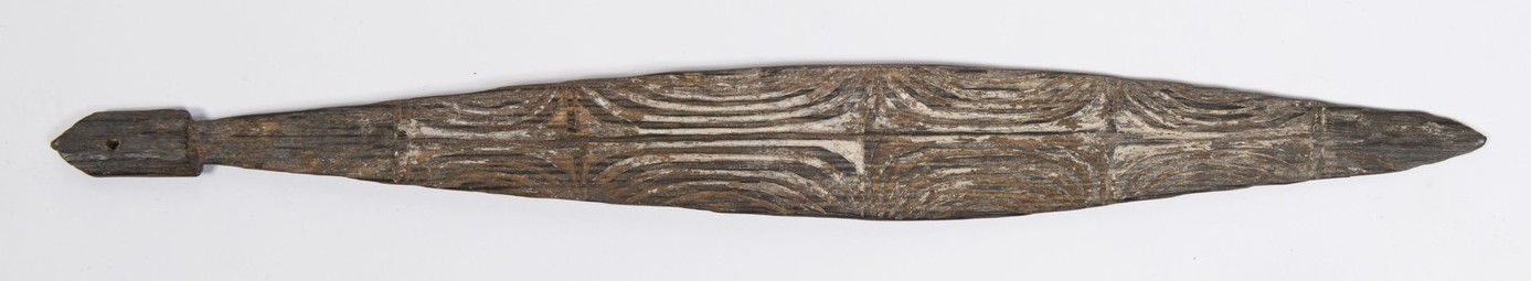Long narrow middle-Fly bullroarer with painted geometric motifs.