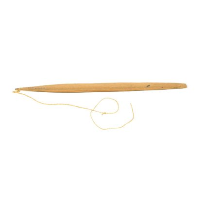 A Kainantu rhombe on its cord, one of four given by Georges Barbey in 1960.