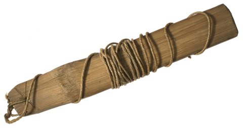 Blantyre bullroarer, late nineteenth century: a long flat brown wooden slat with rough cord looped around its ends and wound about the middle.