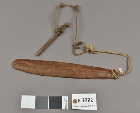 Regional comparison—not the documented Mboum instrument. This complete Duru (Dii) bullroarer from Adamaoua retains its notched wooden blade,...