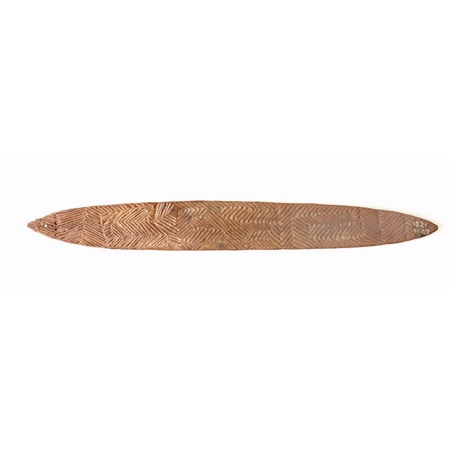 The Yindjibarndi bullroarer RV-1321-47 itself: an incised wooden blade acquired in 1901, pierced once at the terminal end for its cord.