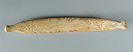 Engraved reindeer-antler blade with a leaping horse among branching strokes, La Vache, Ariège.