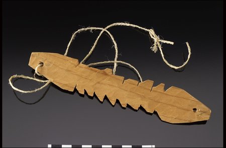 Kotzebue, Alaska, root blade with deep sawtooth notches on both long edges, a hole near each end and a loose twisted cord.