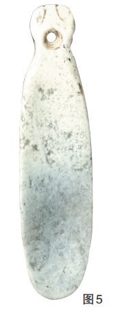 Newspaper Fig. 5: De Fu Museum jade insect-head pendant, perforated through its neck.