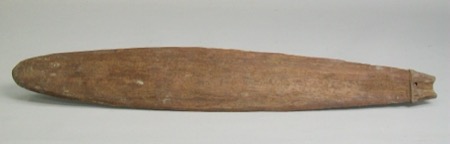 An Iatmul bull-roarer from the Middle Sepik, its plain leaf-shaped blade ending in a small notched grip pierced for the cord; a representative...