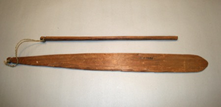 The Hesquiaht bull-roarer documented here, inked IV A 1488 on its blade — a long tapered wooden slat joined by a twisted plant-fibre cord to...