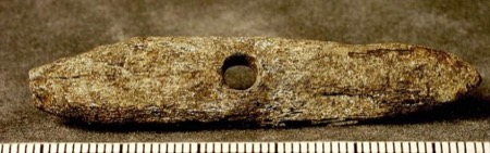 Representative northern European bone bullroarer from Gotland.