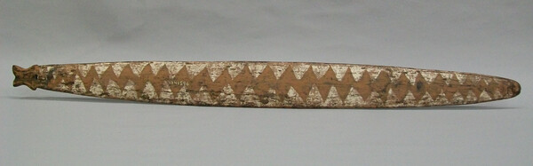 SMB VI 41596, a 93 cm painted wooden bullroarer from a camp at Kaulagu, read here as historical Korogo in the Western Iatmul / Nyaura locality...