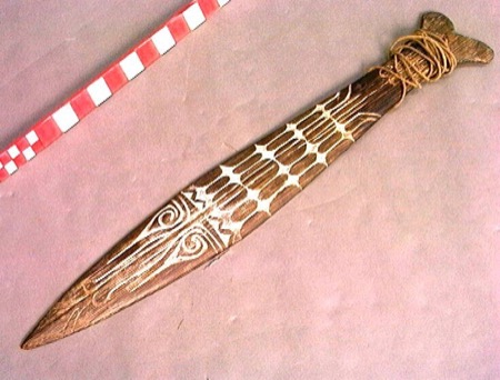 Representative—not this record’s object: a Kanum bull-roarer from Merauke, the nearest South Papua specimen with an open image; the Muyu mulin...