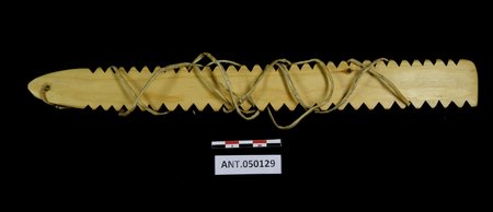 Deg Hit'an (Ingalik) bull-roarer, spruce with rawhide line, made by Billy Williams at Anvik, Alaska — the documented object.