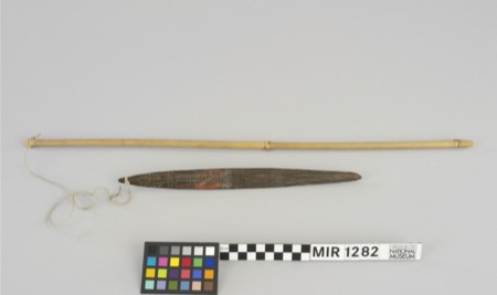 The Sepik blade MIR 1282 complete with its bamboo cord-carrier, head carved as a crocodile.