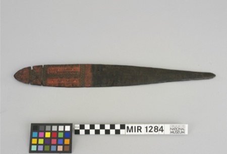 Its mate MIR 1284, a cross-carved head above red-banded engraving.