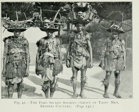 Tasso men of the Poro secret society in Imperri country, photographed by Alldridge in 1901 — the society whose min bull-roarer is documented...