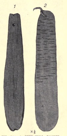The Yuin bull-roarer mudthi, drawn by Howitt in 1904 — a plain pointed blade with a single perforation, shown beside a feather-patterned...