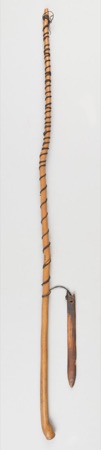 A complete Yoruba Oro rig obtained from Ibadan people: narrow blade, cotton cord, and long wooden handle; British Museum Af1914,-.33.