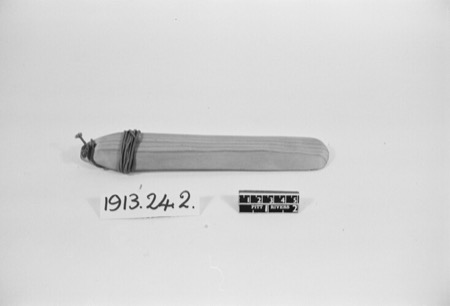 The first of two Norwich Buzzer bullroarers from St Paul's Parish, Pitt Rivers Museum 1913.24.2.