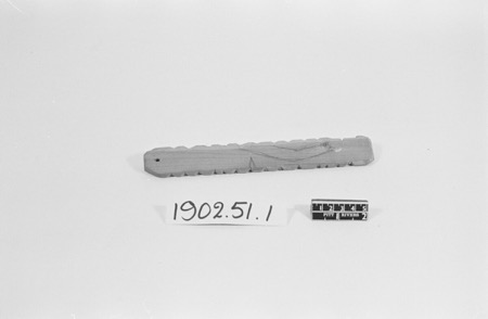 Bedford Whizzing stick, a serrated terminal-hole wooden blade, Pitt Rivers Museum 1902.51.1.