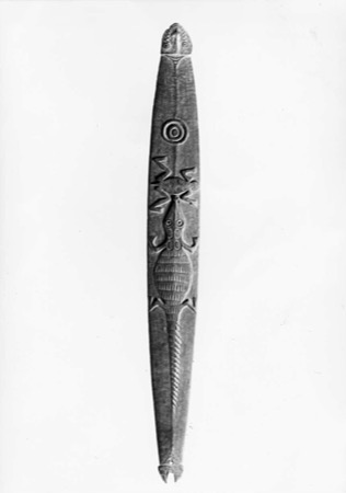 Archival full-length view of the Palimbei blade and its carved animal procession.
