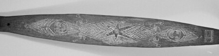 Double-ended figured blade of an Orokolo bull-roarer (Pitt Rivers Museum 1933.81.5).