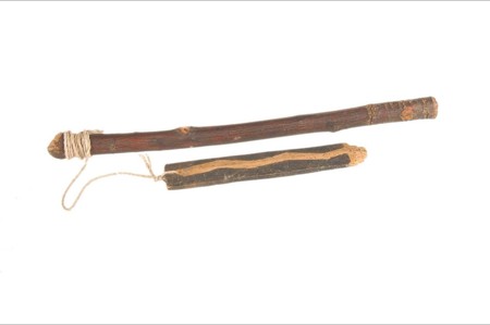 For comparison, another Hopi bullroarer, in the Musée du quai Branly: a painted slat with a lightning stripe, corded to a red handle stick.