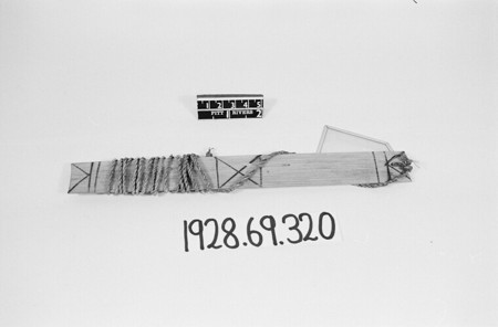 Lhota Naga threm-threm bull-roarer, Okotso village. PRM 1928.69.320.