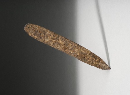 a Tusia Do-society iron bullroarer from Burkina Faso.