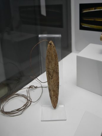 Representative comparison—not this record’s object: the engraved Paleolithic bone bramadera at Altamira.