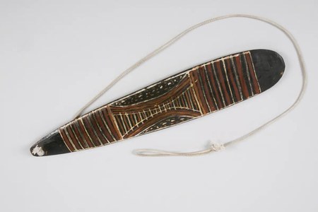 A painted churinga from the Ringve Music Museum