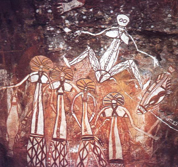 Aboriginal rock-art panel: a group of tall ancestral women with headdresses and cross-hatched skirts